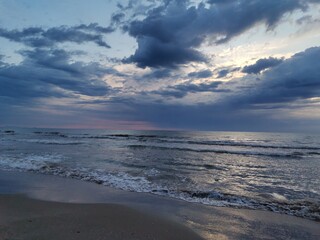 Sunrise with clouds on the beach