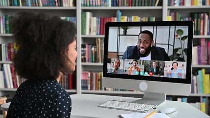 Video call, online education. African American happy female student, learning distantly, watches online lecture, communicates with colleagues, multiracial people on computer screen, virtual meeting