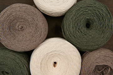 macrame, weaving, hobby threads multicolored close-up from above