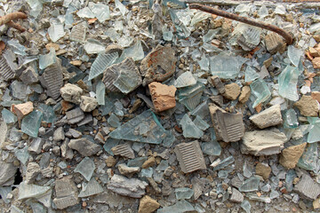 Background and texture of a pile of construction debris in an abandoned old industrial building...