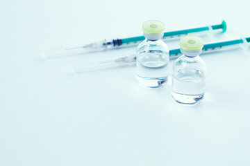 Covid-19 Corona Virus 2019-ncov vaccine vials medicine drug bottles syringe injection. Vaccination,...