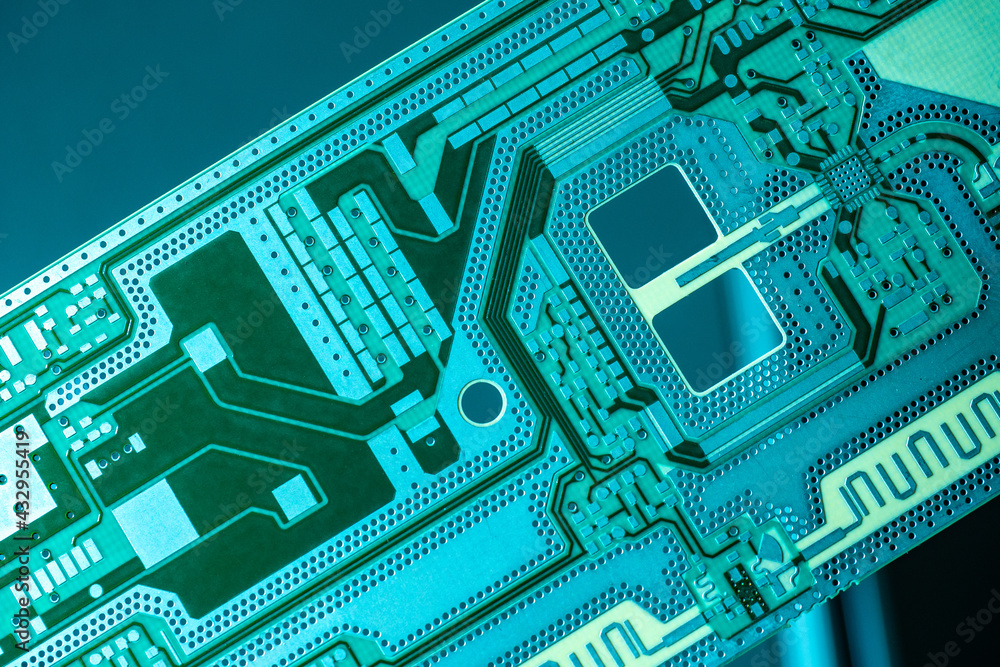 Poster green background with printed circuit board. printed circuit board close-up. the concept of radio el