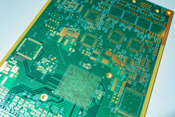 The green printed circuit board is located diagonally. A board for attaching microchips. Production...