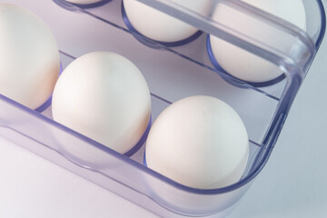 White eggs on the white background