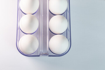 White eggs on the white background