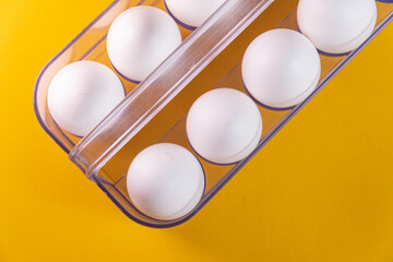Eggs on the yellow background