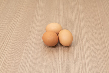 Eggs on the brown background
