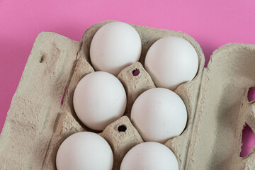 Eggs on the pink background