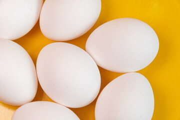 Eggs on the yellow background