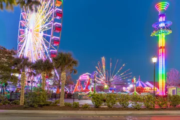 Fotobehang Thrilling carnival rides at Myrtle Beaches Boardwalk © Ryan