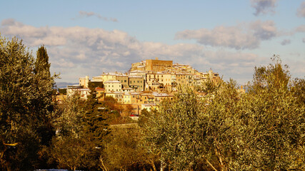 Italy Old Village and hills in Tuscany under the snow