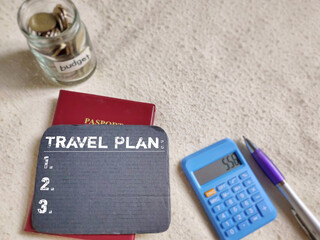 Economy Concept. TRAVEL PLAN text background. Stock photo.