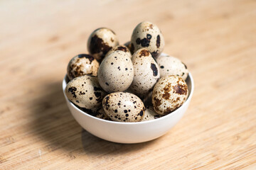 Bowl of speckled quail eggs