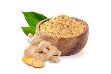 Ginger powder in wooden bowl with root and slices on white background.