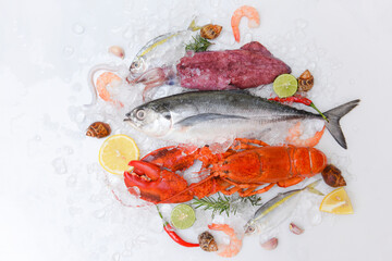 Fresh fish and seafood plate with Shellfish shrimps prawns crab shell squid octopus crab lobster and fish ocean gourmet dinner, Fresh raw seafood on ice with herbs and spices at the fish market food
