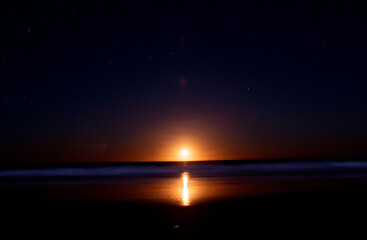 Golden Moon Rises Over Gold Coast Beach and Ocean