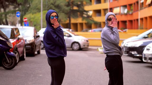 street dance - synchronized ballet of two girls in the hip hop style 