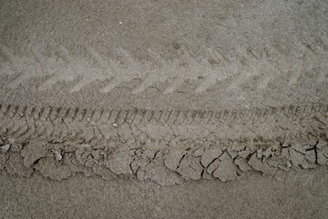 tire prints on sand