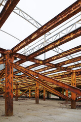 Rusty steel bridge on the beach