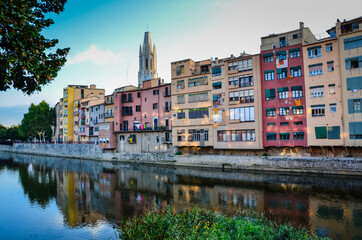 Fototapeta na wymiar Colourful Row Buildings in Girona Spain Streetscape