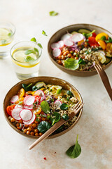 Fototapeta na wymiar Healthy quinoa vegetarian buddha bowls
