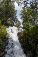 A vertical shot of San Pedro Atlixco waterfall in Mexico