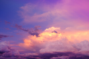 Heaven background.Sky.Multicolored clouds. Summer weather. Clouds of blue, lilac, yellow and pink colors. Heaven at Sunset.Colorful  sunset sky.Summer time