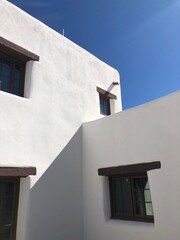A white adobe house