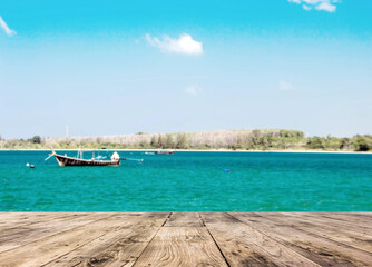 Fototapeta premium relax view with wood boat and clean sea in thailand