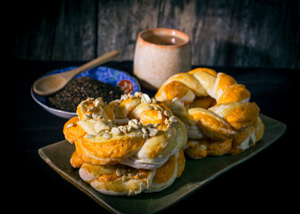 Homemade sourdough bread on a dark table with a napkin