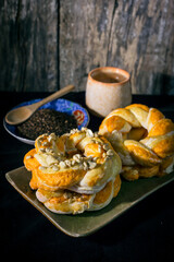 Homemade sourdough bread on a dark table with a napkin