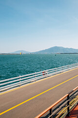 Obraz na płótnie Canvas Odongdo Island road and sea in Yeosu, Korea