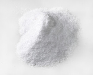 handful of dextrose crystalline sugar on white