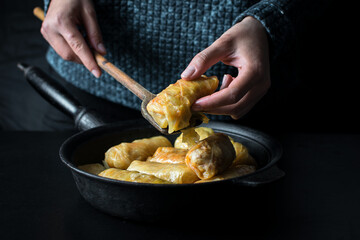 Cabbage rolls with meat, rice and vegetables. Stuffed cabbage leaves with meat. Known as sarma, golubtsy, dolma.