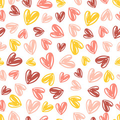 Seamless pattern with pink and yellow hearts.