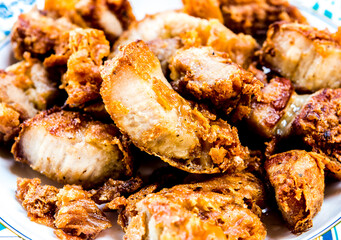 Fried fritter pork belly in  plate , in door  Chiangmai  Thailand