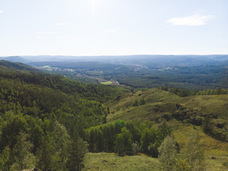 evergreen fir forest on a hilltop among the mountains of the National Park of the Republic of Bashkortostan on Lake Bannoye