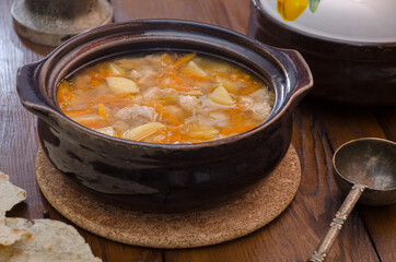 chicken soup in a pot