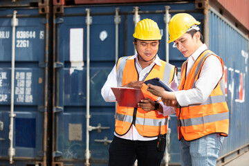 factory workers or engineers talking about work and project in factory workshop