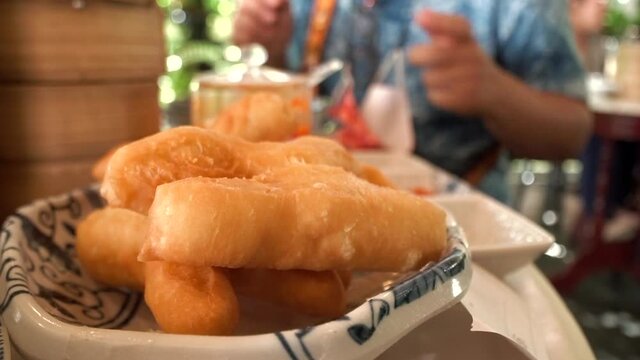 Deep fried doughstick, Chinese snack food served with boiled rice or soy milk or sweet milk or custard in breakfast.