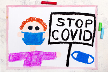 Photo of colorful drawing: Man holding a sign with words Stop coronavirus