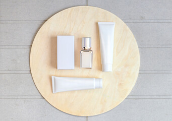 cosmetic Packaging on circle wood board