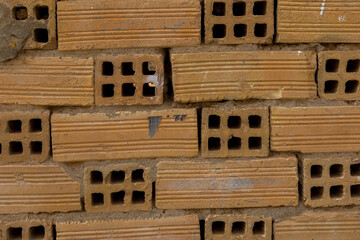  original abstract background from clay brown bricks in closeup