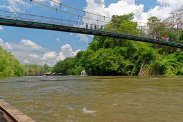 Kanchanaburi, Thailand, Apr 14 2017. Saiyok suspension view from below, Kaw Noi River