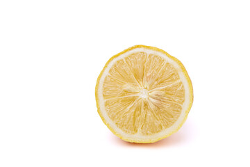 Lemon cut in half isolated on white background