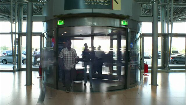extraordinary long exposure time lapse shot of a revolving door at an airport - part 2