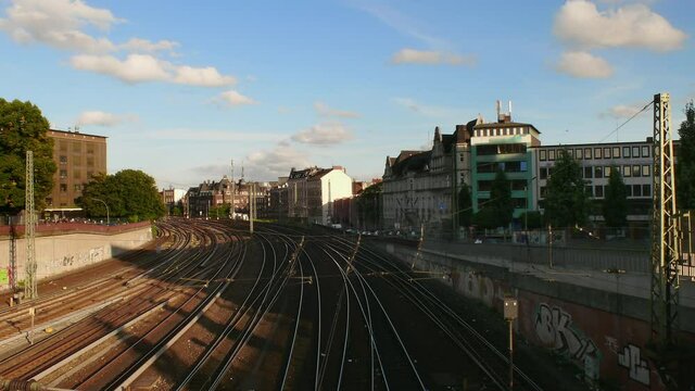 nice time lapse shot of a railway line in hamburg with lots of trains and a great sky, part 1