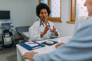 Female doctor giving advice to patient