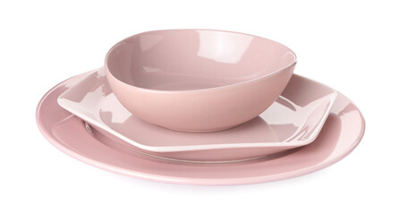 Stack of clean dishes on white background