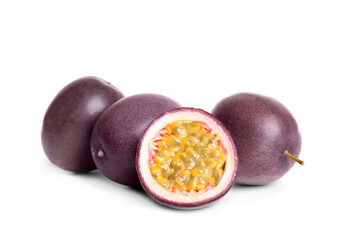 Cut and whole passion fruits on white background